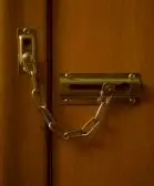 3459057-chain-lock-on-a-cherry-door.webp