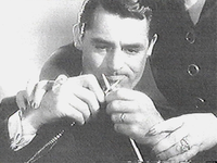 cary_grant_learns_to_knit_in_mr_lucky_2.webp