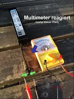 G_Mähroboter_Problem__Multimeter_Trafo_Messung_Pfeil__03.2014_mr.ditschy.webp