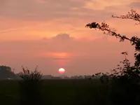 Sonnenuntergang in Fedderwarder Siel.webp
