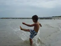 Miles splashing in the Baltic Sea.webp